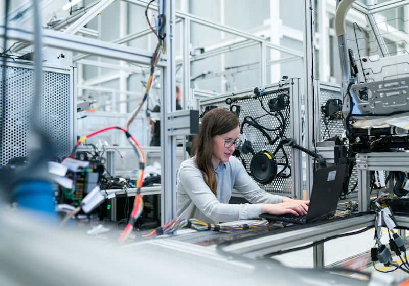 Researcher working on a laptop in an academic setting